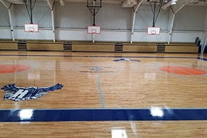 Gym Floor Lettering and Refinishing Services in St. Louis